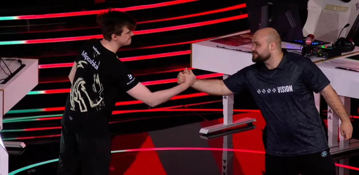 Miposhka and NoOne holding hands after Game 1.webp